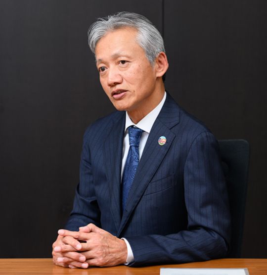 沖縄セルラー 代表取締役社長 菅 隆志