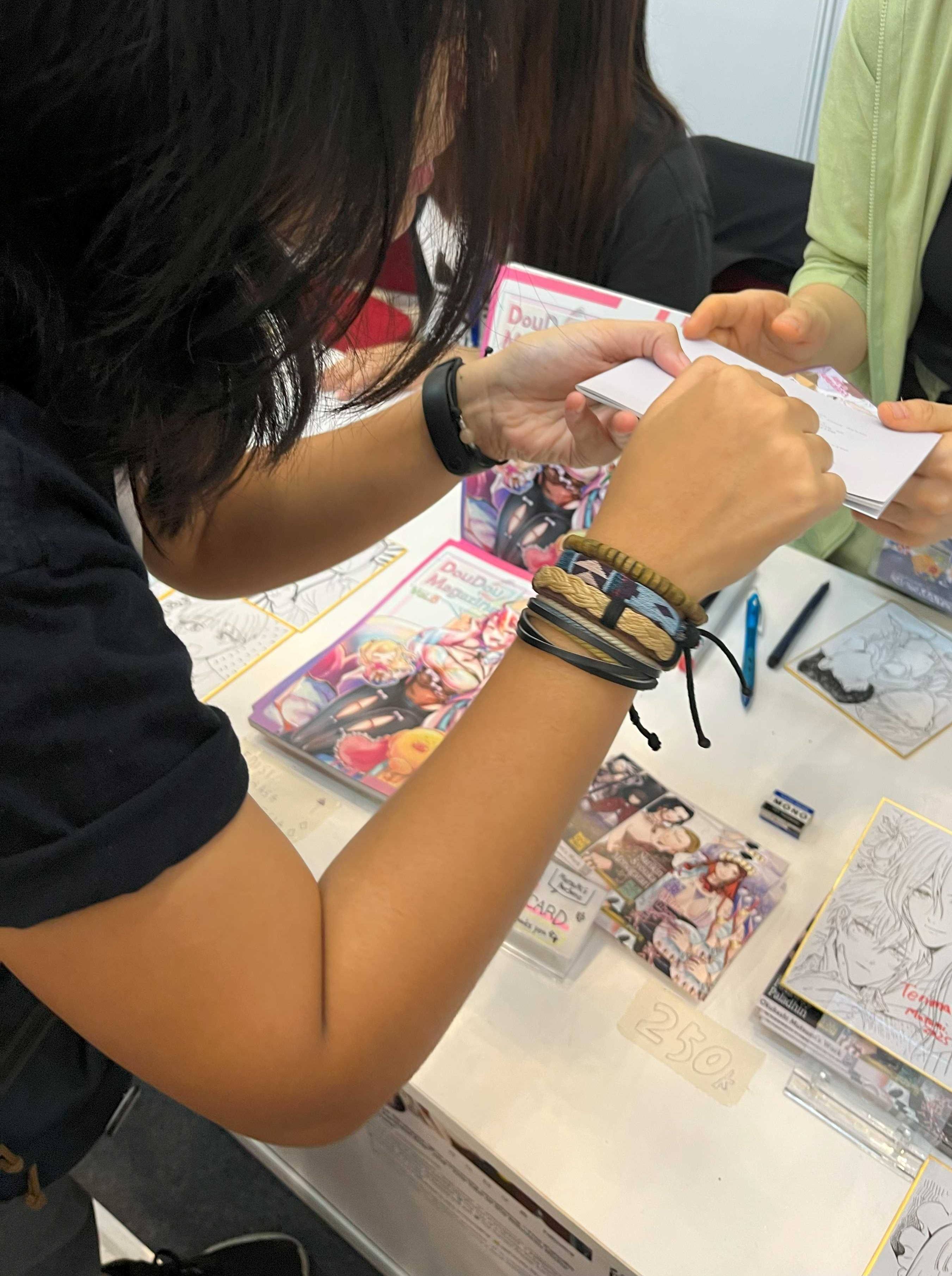 百合マンガを頒布するサークル Magnolia Team の主宰。日本の百合アニメやマンガのコンセプトについて奥橋先生と熱心に交流していた